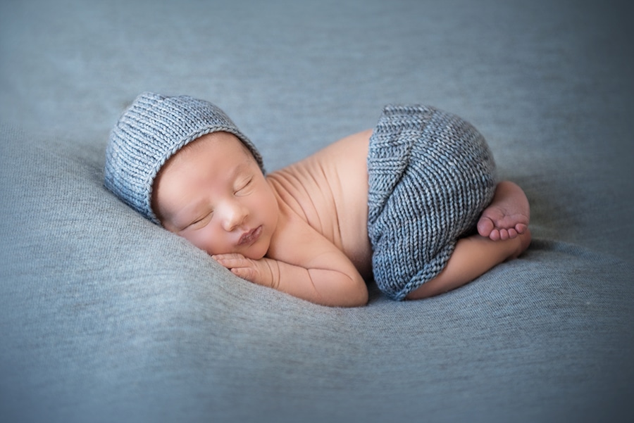 sleeping newborn boy in blue boulder photographer